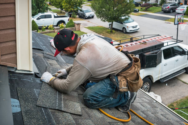 Professional Roof Replacement technician working in Byron, NY